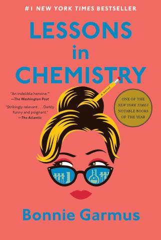 The image shows the cover of the book Lessons in Chemistry by Bonnie Garmus. The image is a simple drawing of a womans face and hair. She has a pencil in her bun. She is wearing sunglasses. In the reflection of the sunglasses you can see chemist bottles and beakers. 