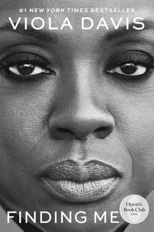 Close-up black and white image of a face with text: "#1 New York Times Bestseller, Viola Davis, Finding Me."