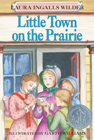 Cover of "Little Town on the Prairie" by Laura Ingalls Wilder, illustrated by Garth Williams, featuring four girls and a kitten.