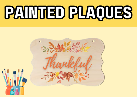 The image shows a plaque that has been painted with fall leaves and the word "thankful". 