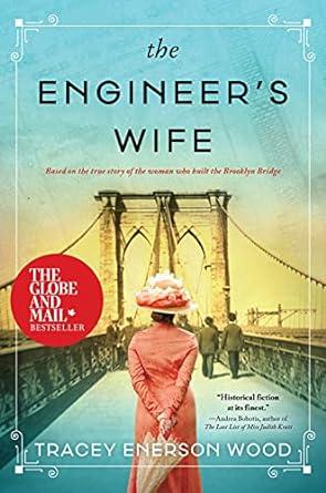 The image is the cover of The Engineer's Wife by Tracey Enerson Wood. It shows a picture of a woman wearing a dress and hat, holding an umbrella. She is walking across a bridge. There is a couple in the distance in front of her. 