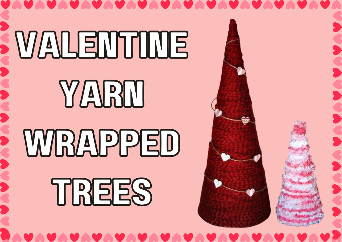 The image shows two foam cones that have been wrapped in yarn and hearts. 